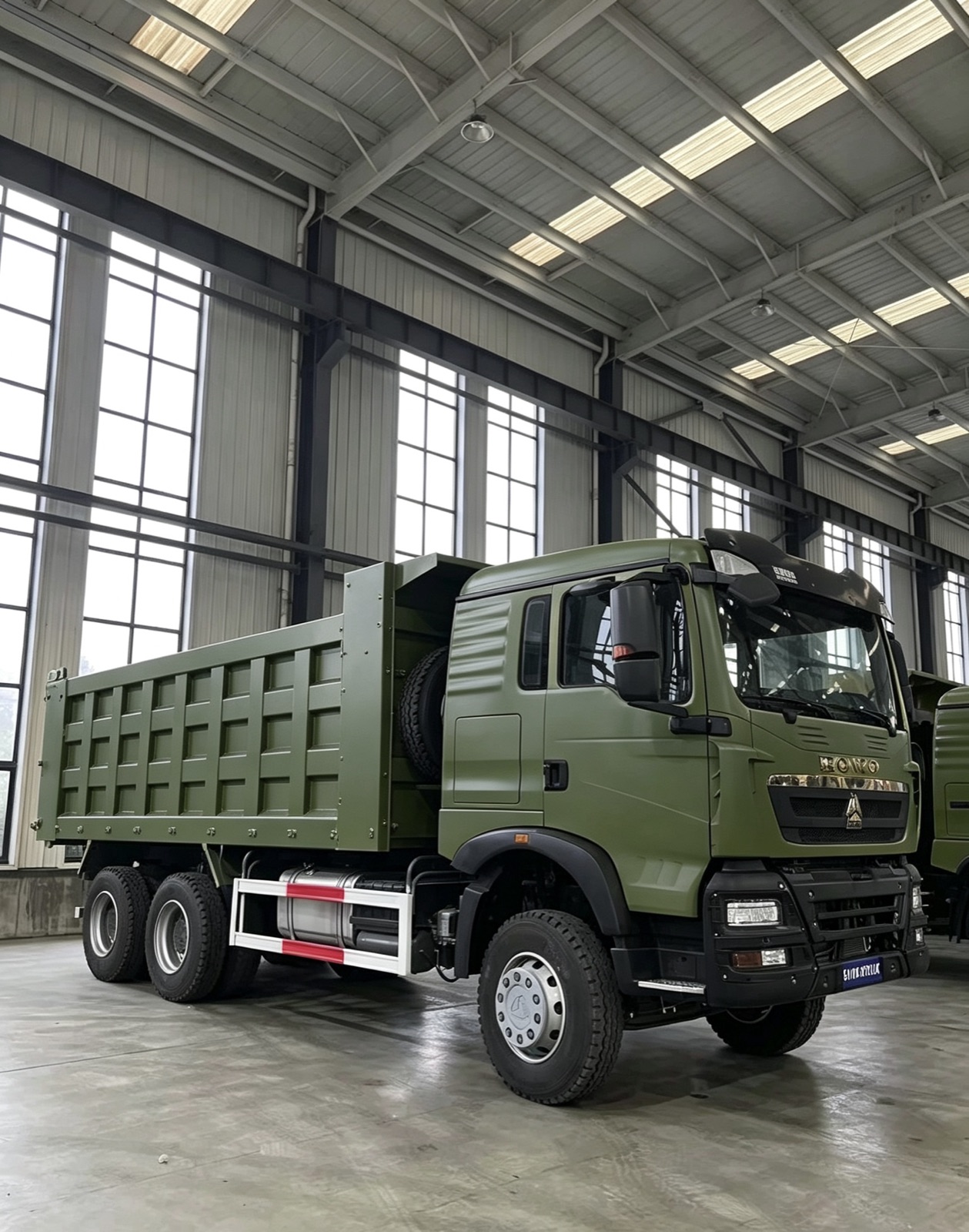 Aerial view of heavy trucks parked in a truck yard